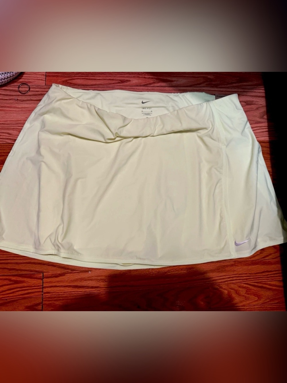 Nike Women's Pale Yellow Athletic Skort with Swoosh